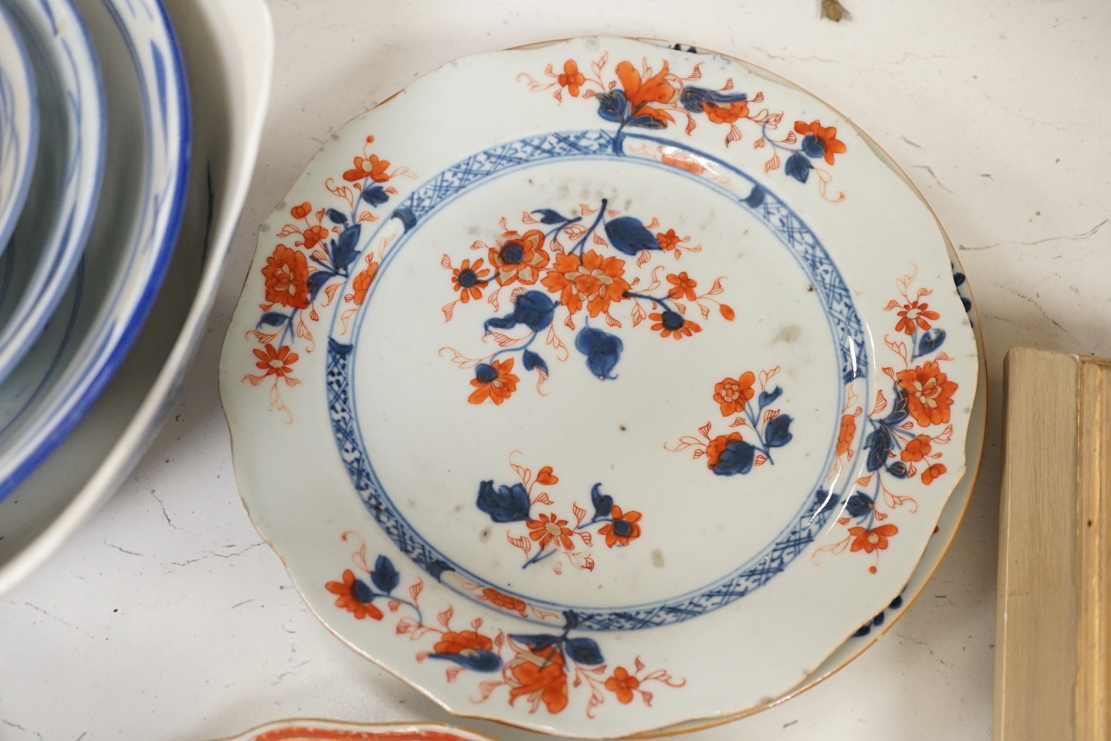 An assortment of Chinese porcelain tin-glazed earthenware charger and a Delft vase